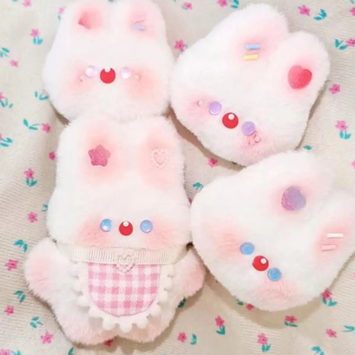 Four custom anime-style bunny plush toys